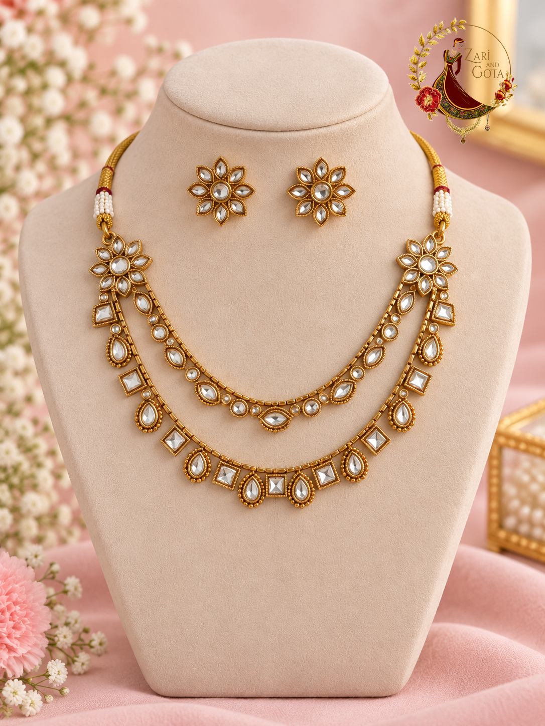 White kundan gold-finish two-strand necklace set with flower stud earrings on a display bust, Zari and Gota UK