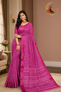 Magenta pink cotton silk chevron print saree with gold zari border, worn by a model
