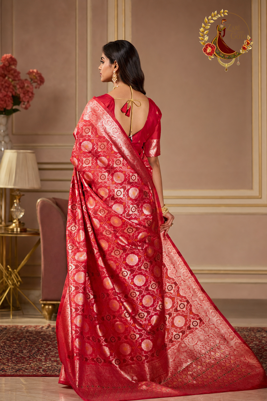 Back view of red Banarasi ghatchola saree showing the woven zari pallu