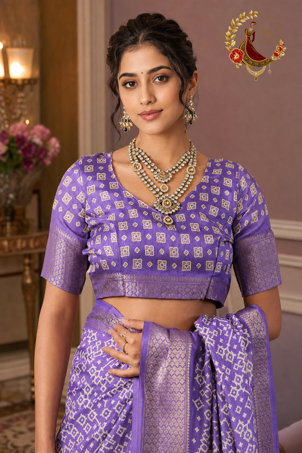 Detail of lavender printed blouse with silver zari sleeve band