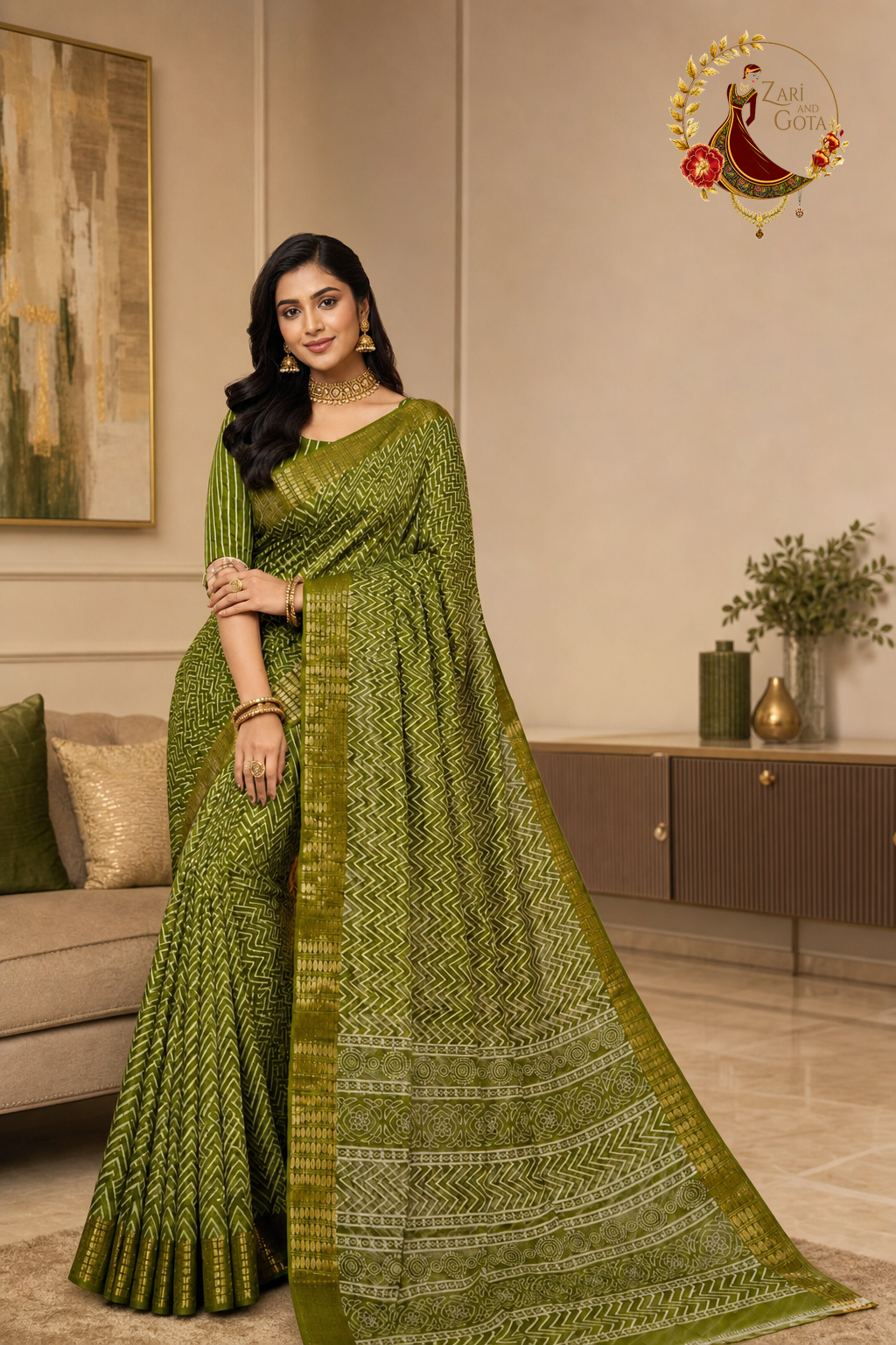 Olive green cotton silk chevron print saree with gold zari border, worn by a model