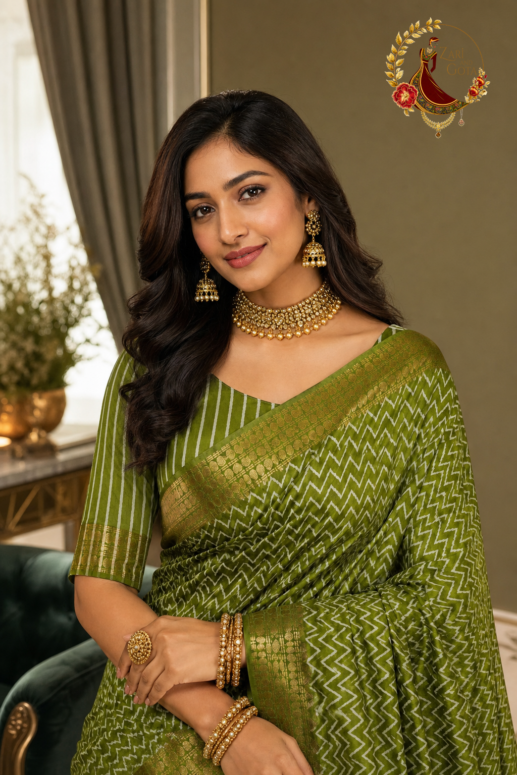Close view of the olive green chevron saree blouse and gold zari border on a model
