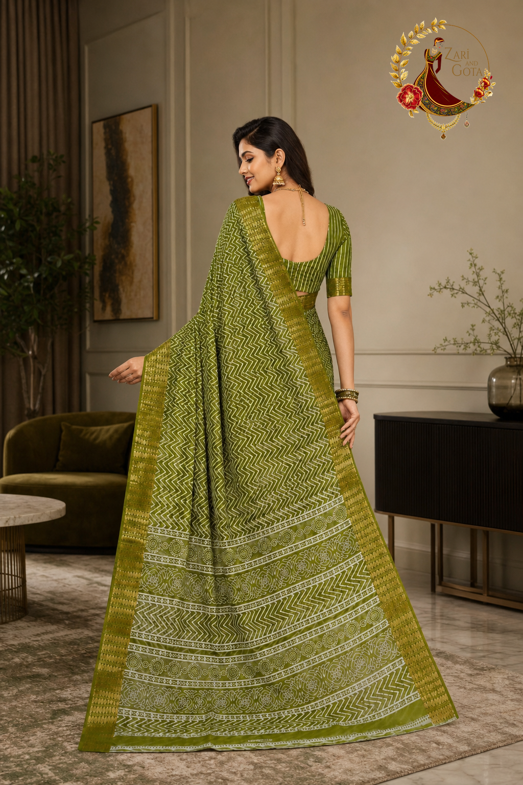 Back view of the olive green cotton silk chevron saree showing the pallu drape