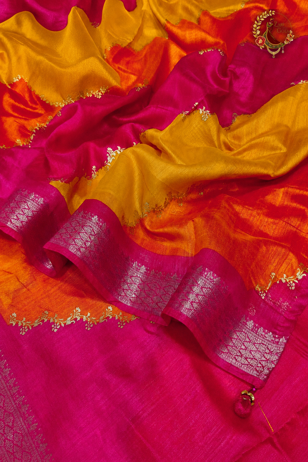 Draped cotton silk saree showing zari border and colour blocked pallu