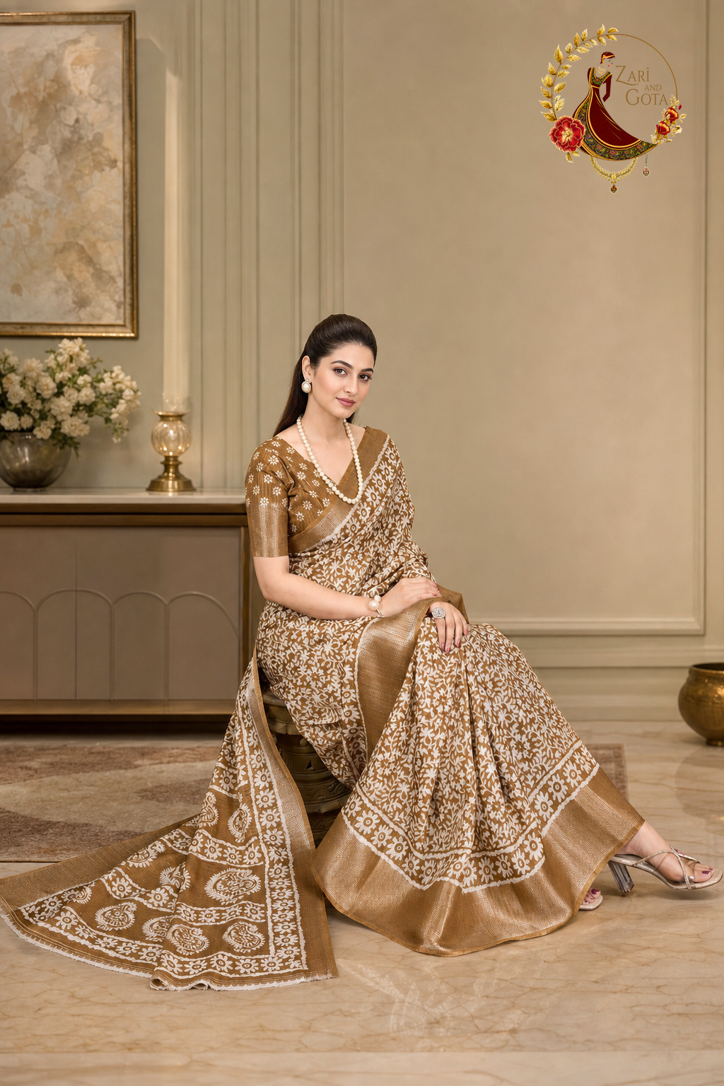 Caramel gold cotton silk saree with the printed pallu spread out
