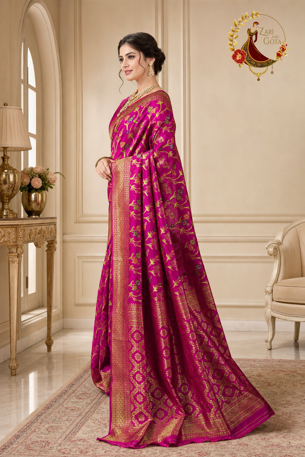 Side view of the rani pink Banarasi saree showing the gold zari border