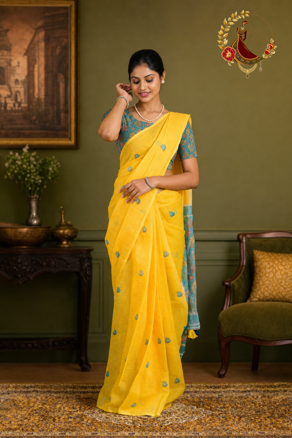 Yellow soft cotton saree with teal leaf butti motifs and kalamkari blouse