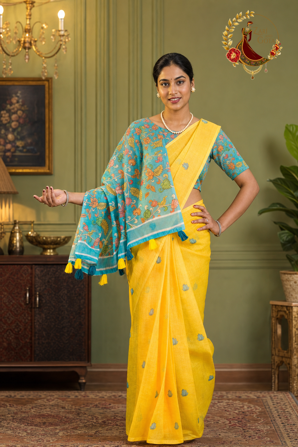 Kalamkari cotton saree draped over the shoulder showing printed pallu and tassels