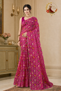 Rani pink kota doria saree with patola-style print, worn by a model