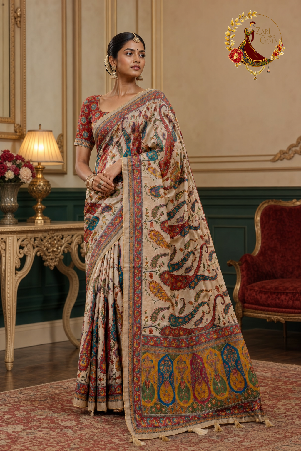 Ivory georgette saree with Kashmiri paisley print and mirror work, worn by a model