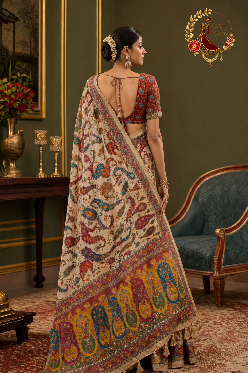 Back view of ivory georgette paisley saree showing the printed pallu
