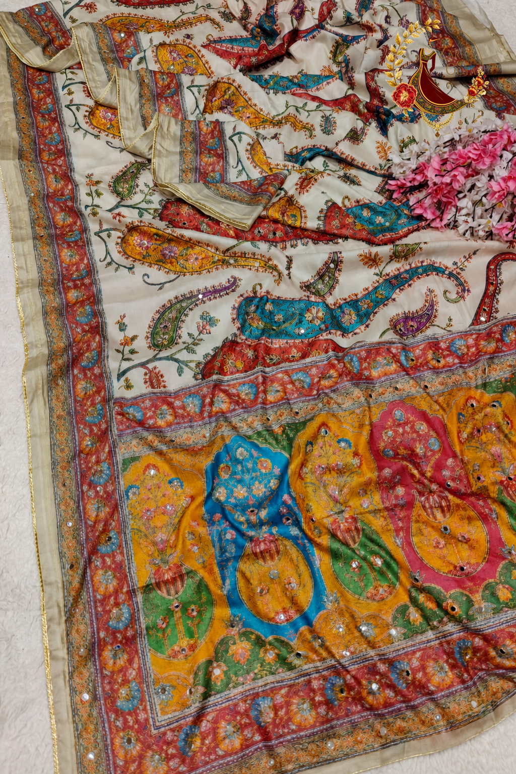 Flat view of the saree showing Kashmiri paisley print across the body