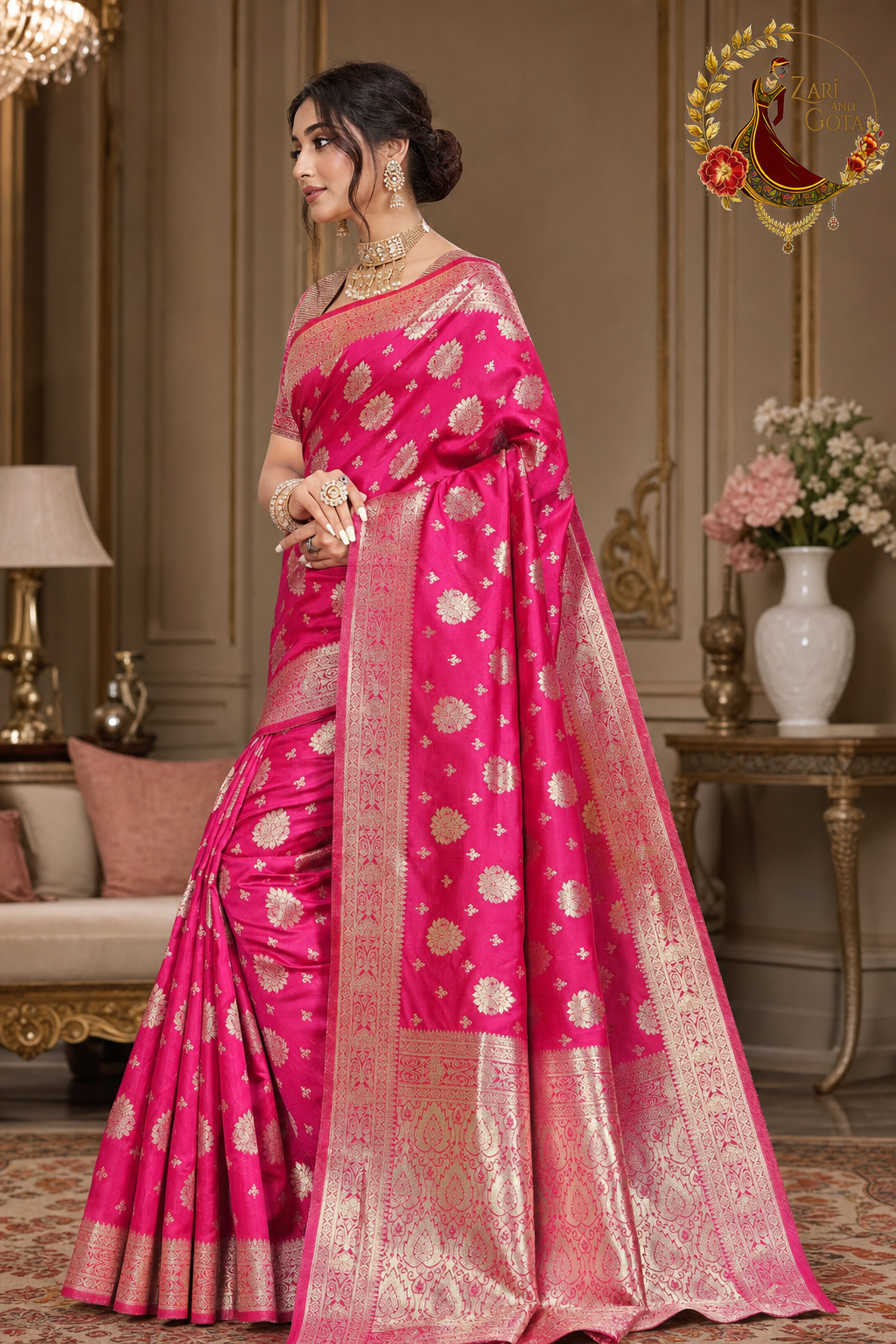 Side view of the rani pink Dola silk saree with gold zari border and pallu