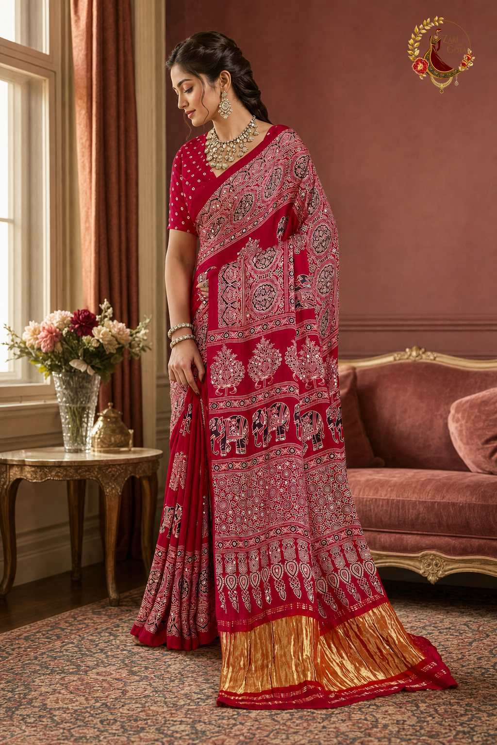 Model wearing red ajrakh print Gaji silk saree, side view showing pallu drape
