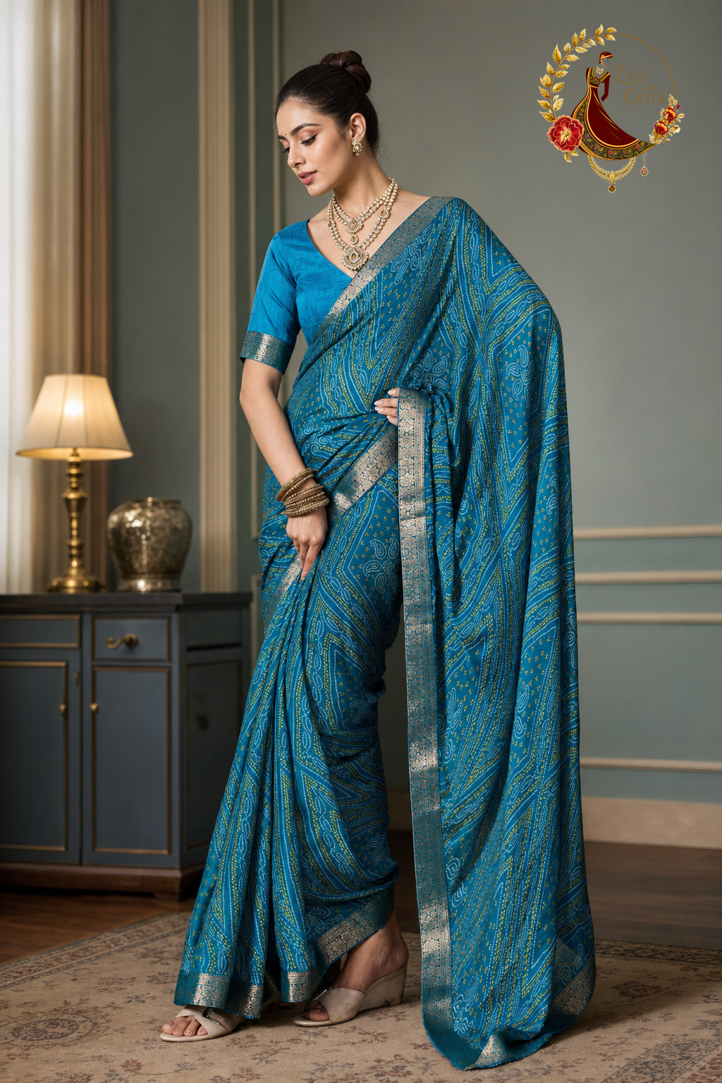 Side view of the turquoise moss chiffon saree showing the pallu drape