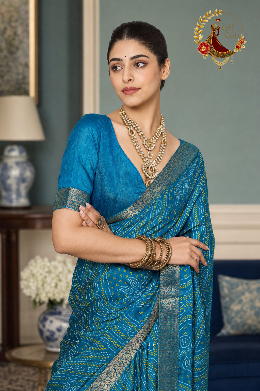 Close view of the yellow dot bandhani bands on turquoise moss chiffon