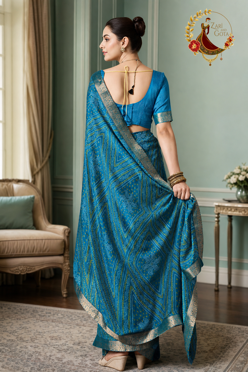 Back view of the turquoise moss chiffon saree and matching blouse