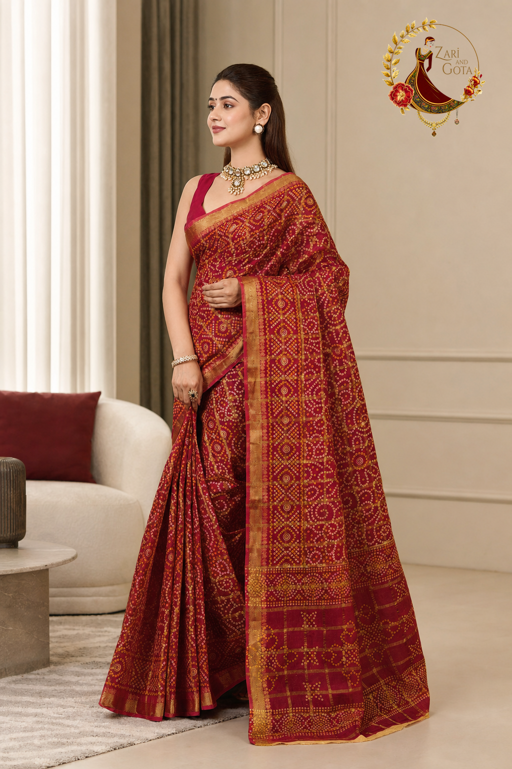 Side view of the red ghatchola saree showing the gold pallu bands