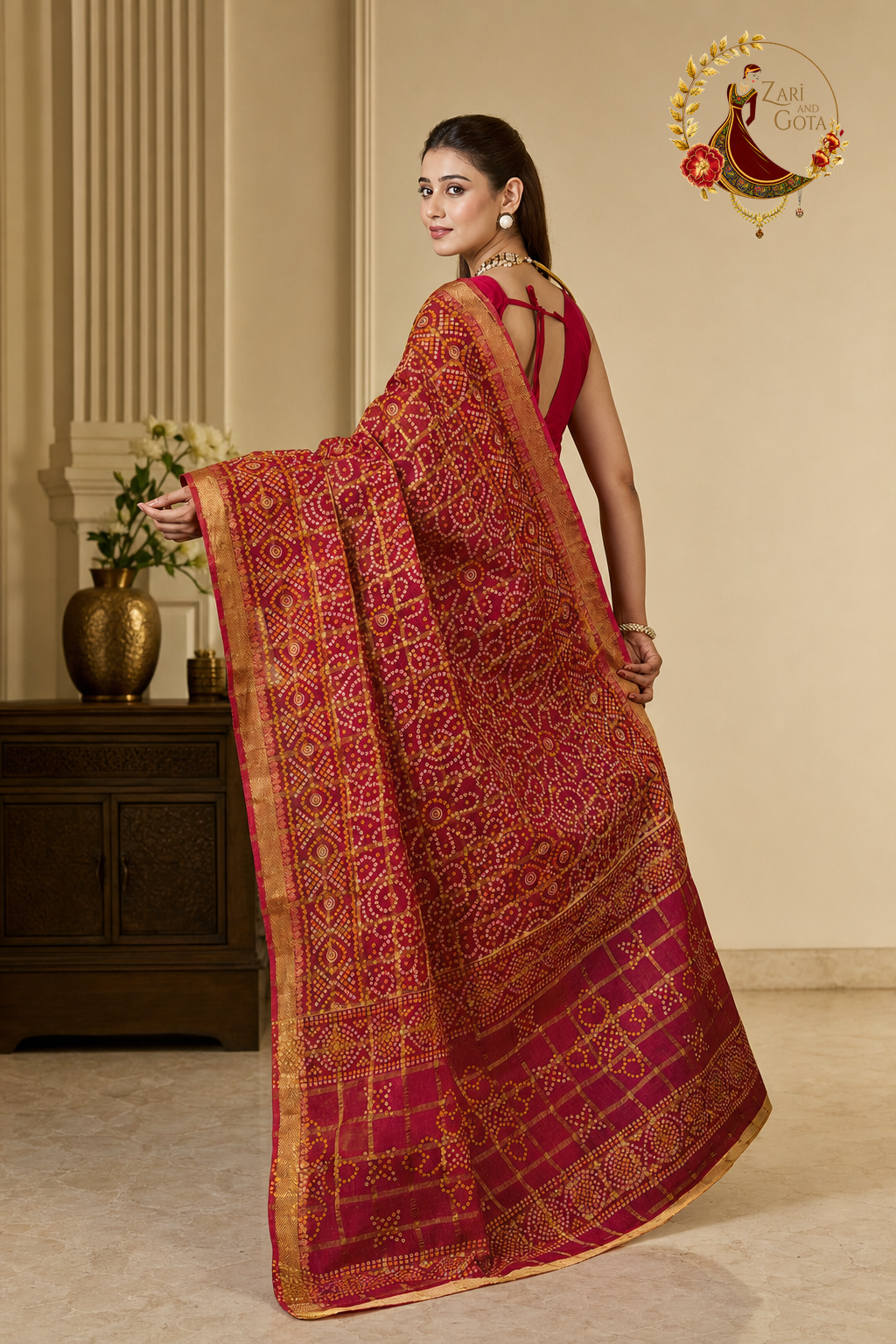 Back view of the red ghatchola saree showing the full pallu
