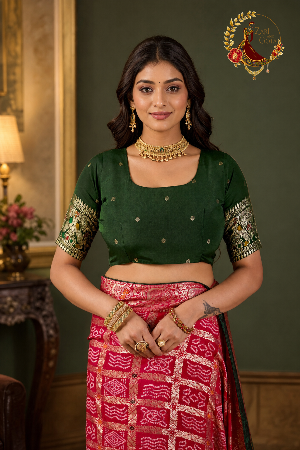 Detail of bottle green blouse with gold butti and woven multicoloured sleeve band