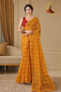 Marigold yellow kota doria saree with patola-style print, worn by a model