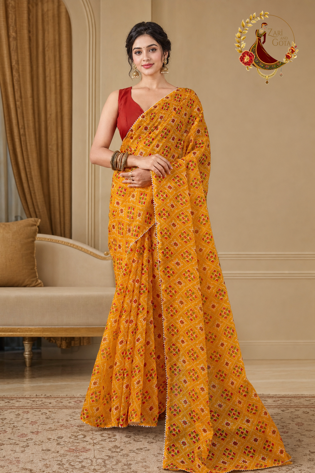 Marigold yellow kota doria saree with patola-style print, worn by a model