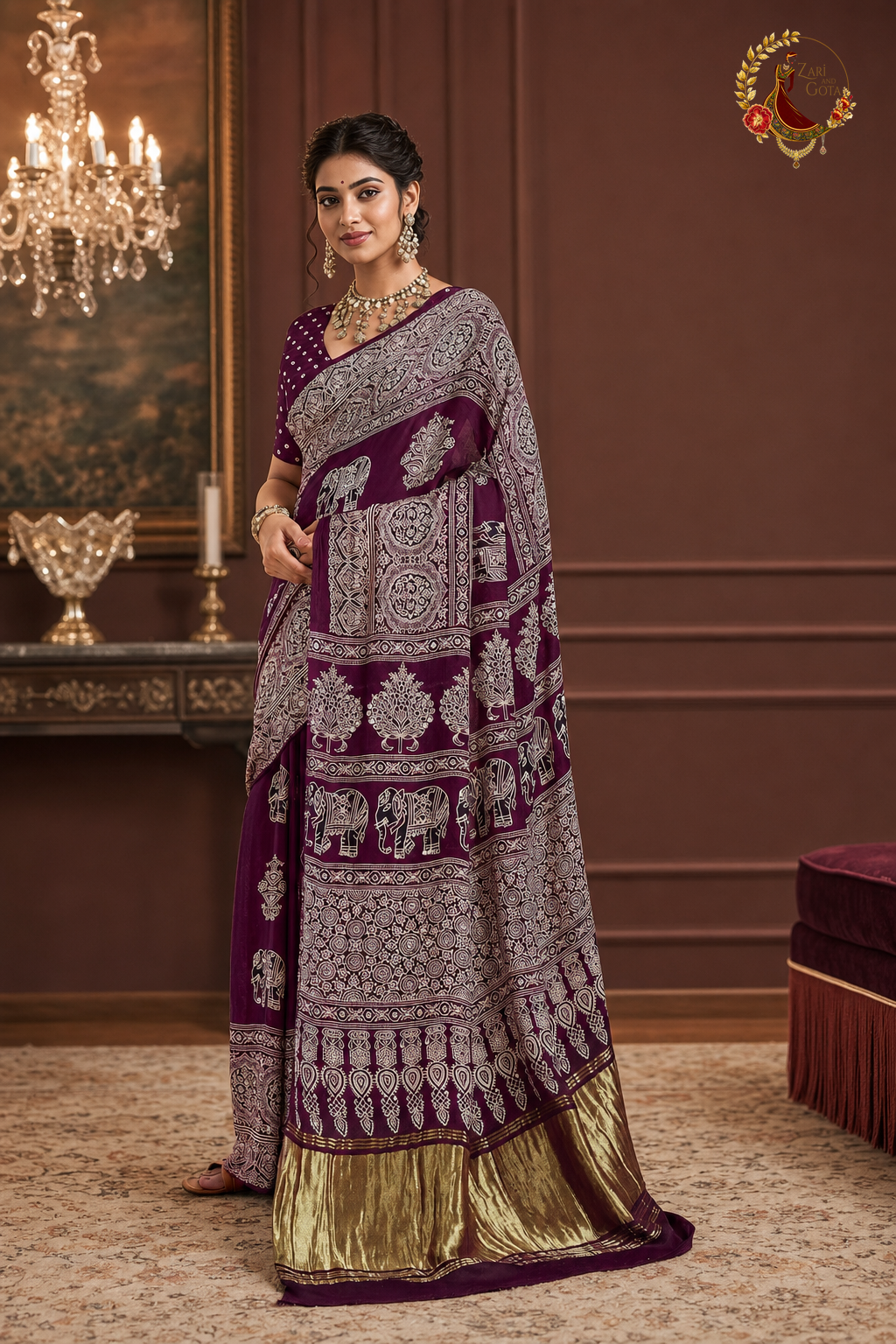 Model wearing plum ajrakh print saree showing pallu drape and gold tissue hem