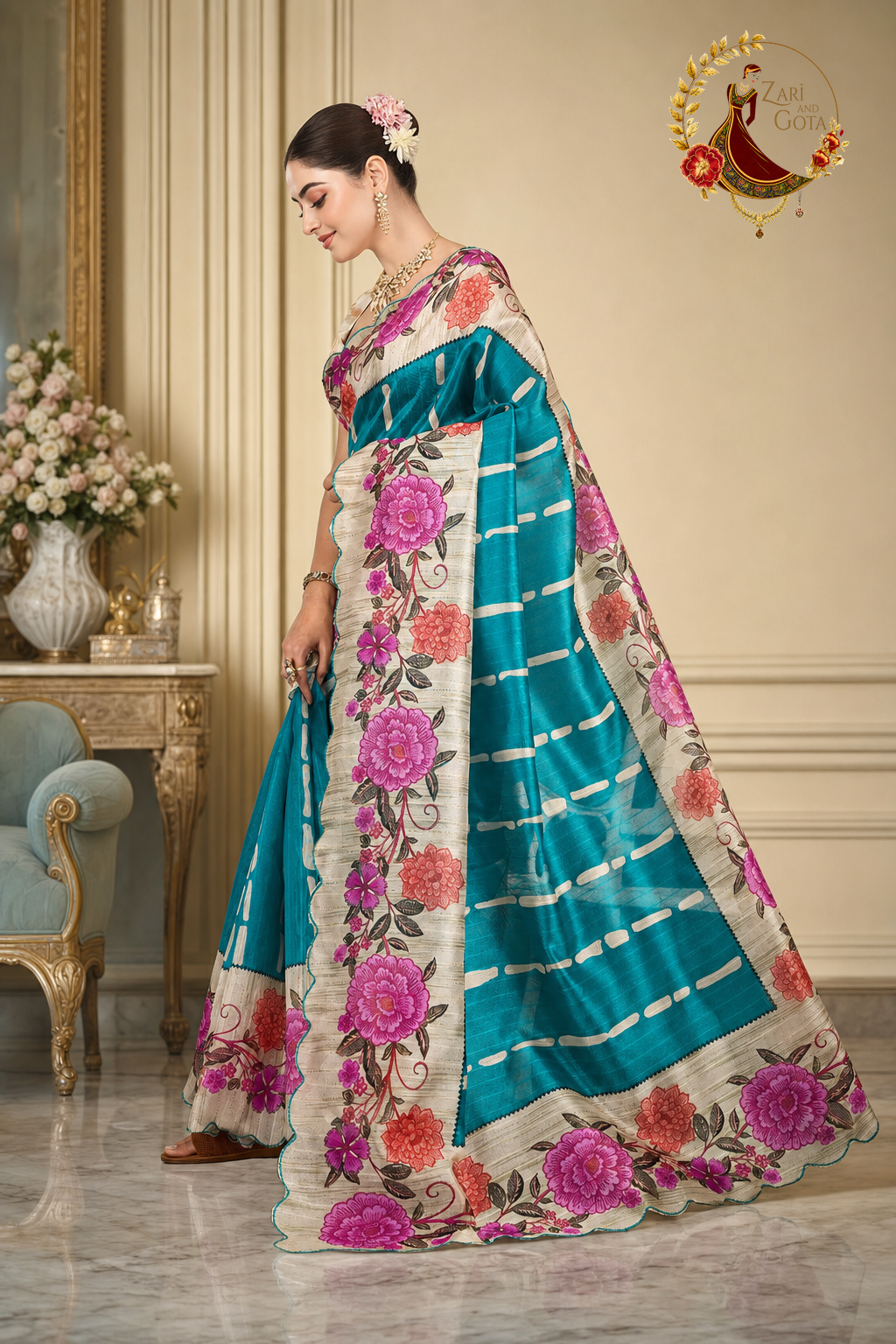 Teal tissue silk floral print saree with cut-work border, worn by a model, side view showing the pallu