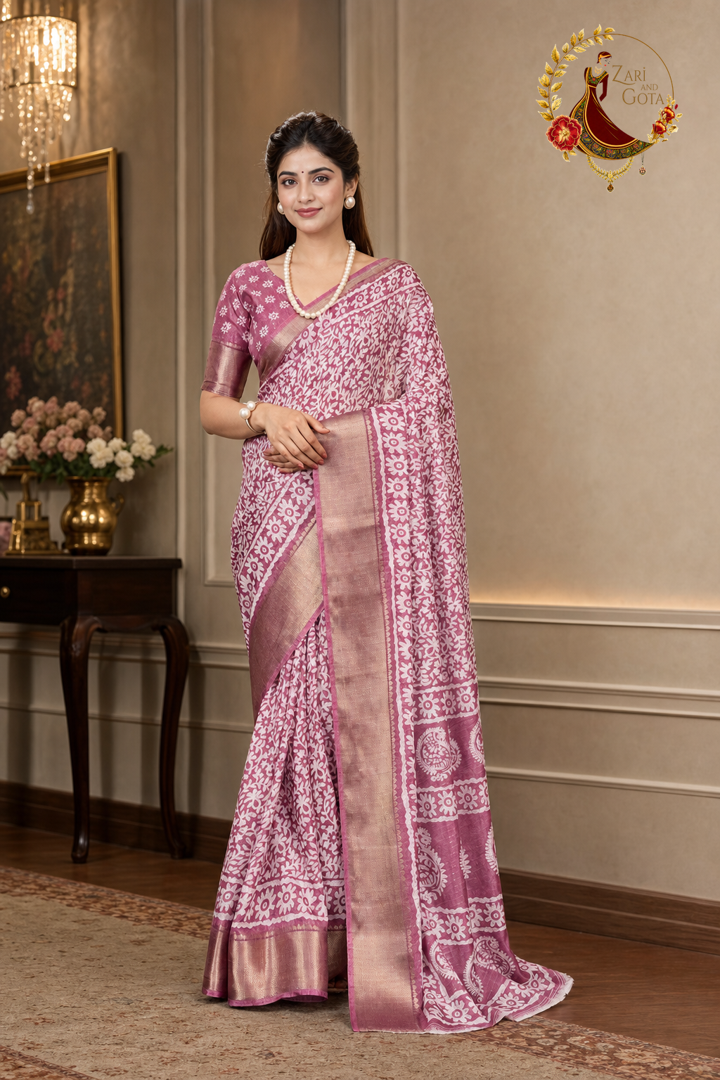 Dusty rose cotton silk saree with ivory batik print and zari border, worn by a model