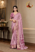Dusty rose cotton silk saree with ivory batik print and zari border, worn by a model