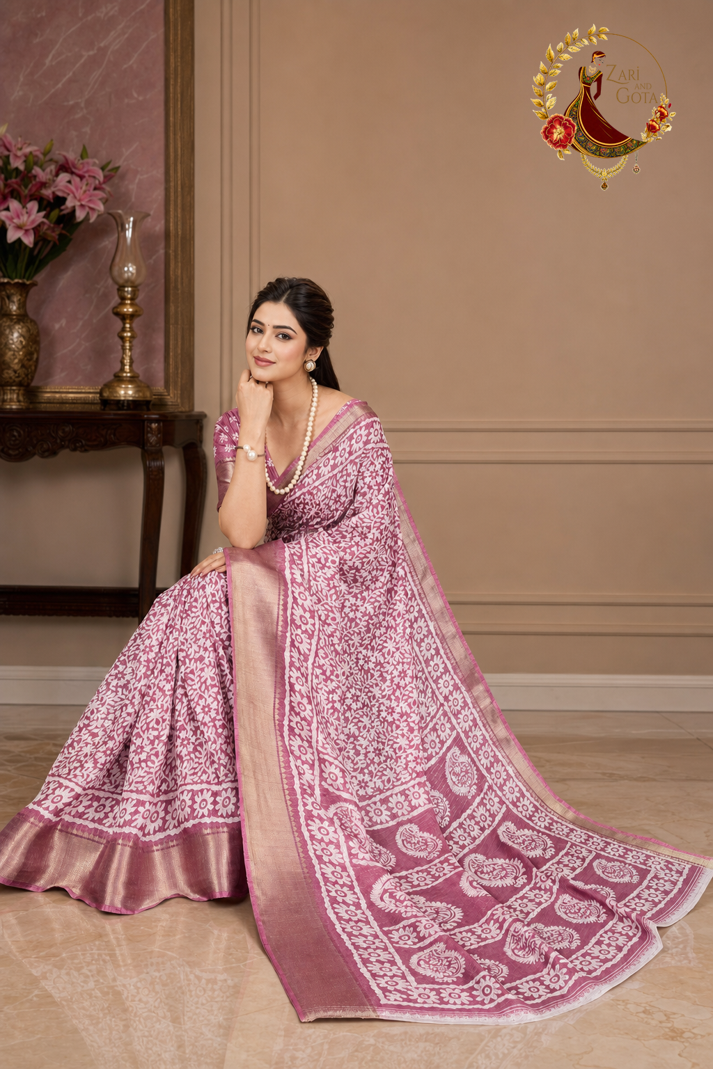 Dusty rose cotton silk saree with the printed pallu spread out