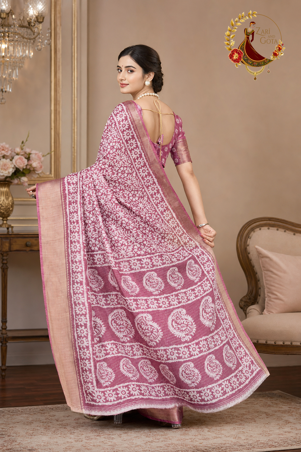 Back view of the dusty rose printed saree and its matching blouse