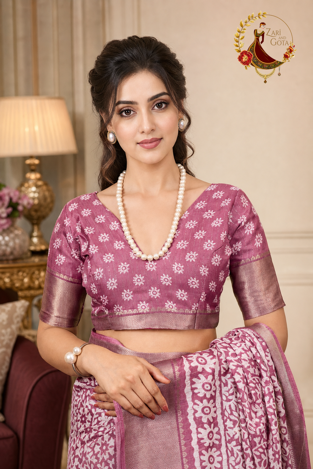 Detail of the dusty rose blouse with ivory floral butti print and zari band