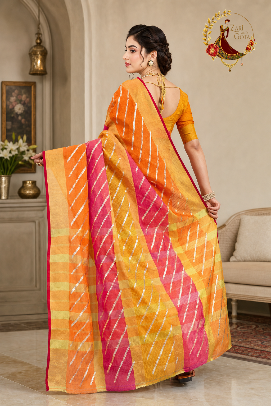 Back view of the marigold kota doria saree and its orange blouse