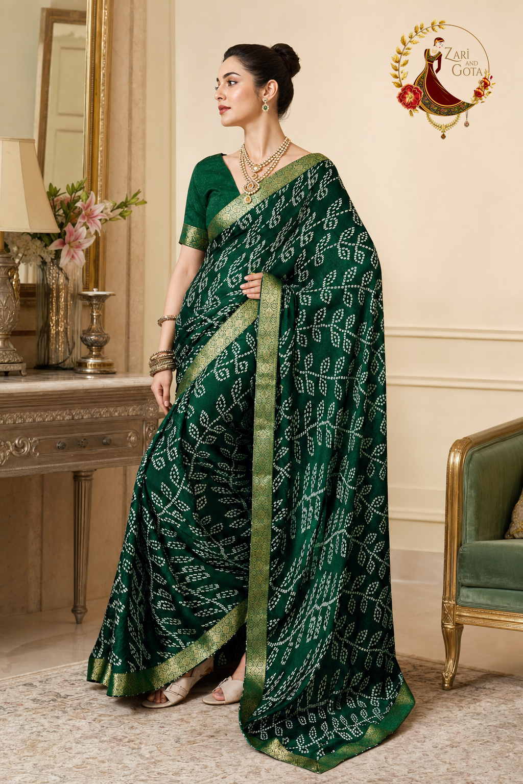 Side view of the bottle green bandhani print saree showing the gold zari selvedge