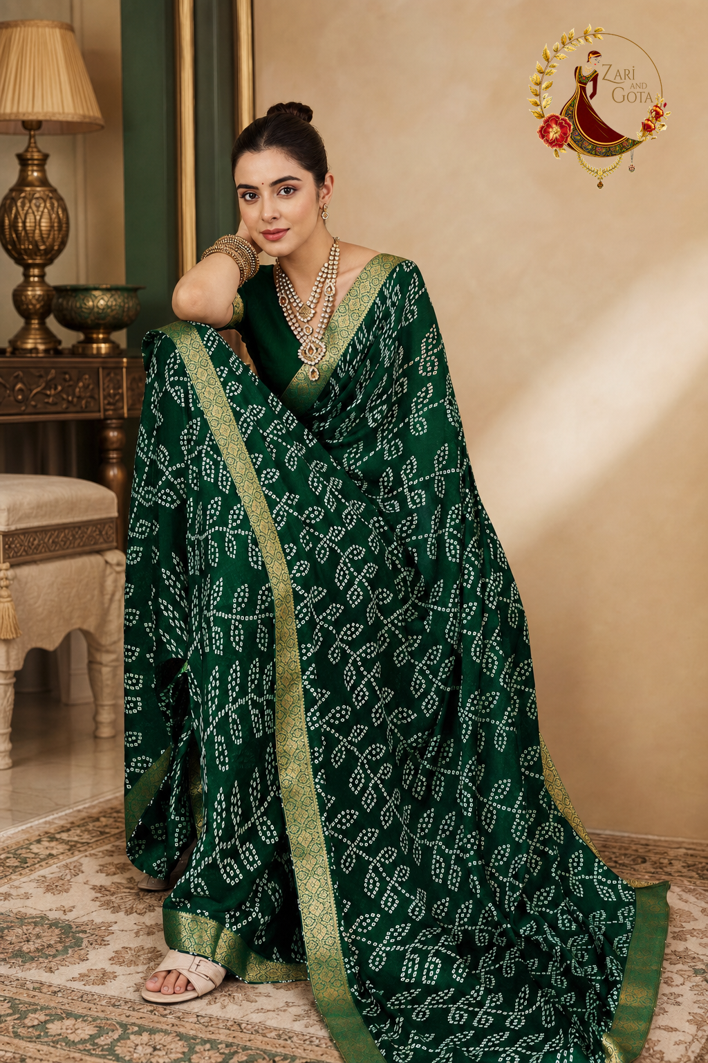 Bottle green moss chiffon saree with the pallu draped over the shoulder