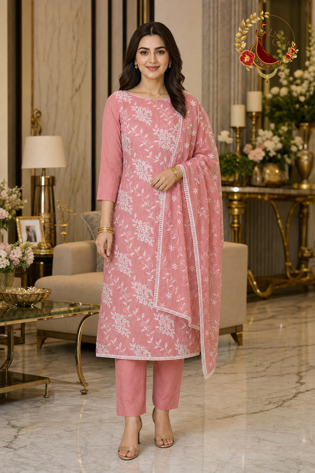 Peachy pink crushed cotton unstitched suit set with all-over white thread floral embroidery and embroidered kota dupatta, worn by a model, Zari and Gota UK