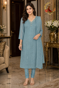 Firozi georgette chikankari unstitched suit set with beaded V neckline and chikankari dupatta, worn by a model with a churidar, Zari and Gota UK