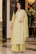 Lemon Yellow cotton silk unstitched suit set with white thread floral embroidery and tissue dupatta, worn by a model with palazzo, Zari and Gota UK