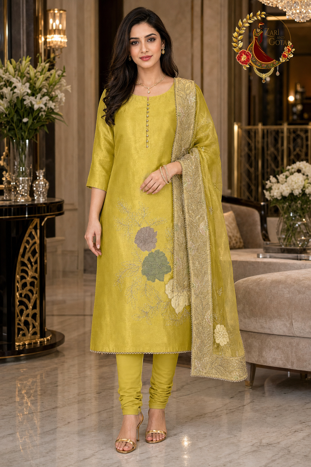 Lemon Yellow shimmer Jimmy Choo unstitched suit set with appliqué flowers and gold-bordered designer dupatta, worn by a model with a churidar, Zari and Gota UK