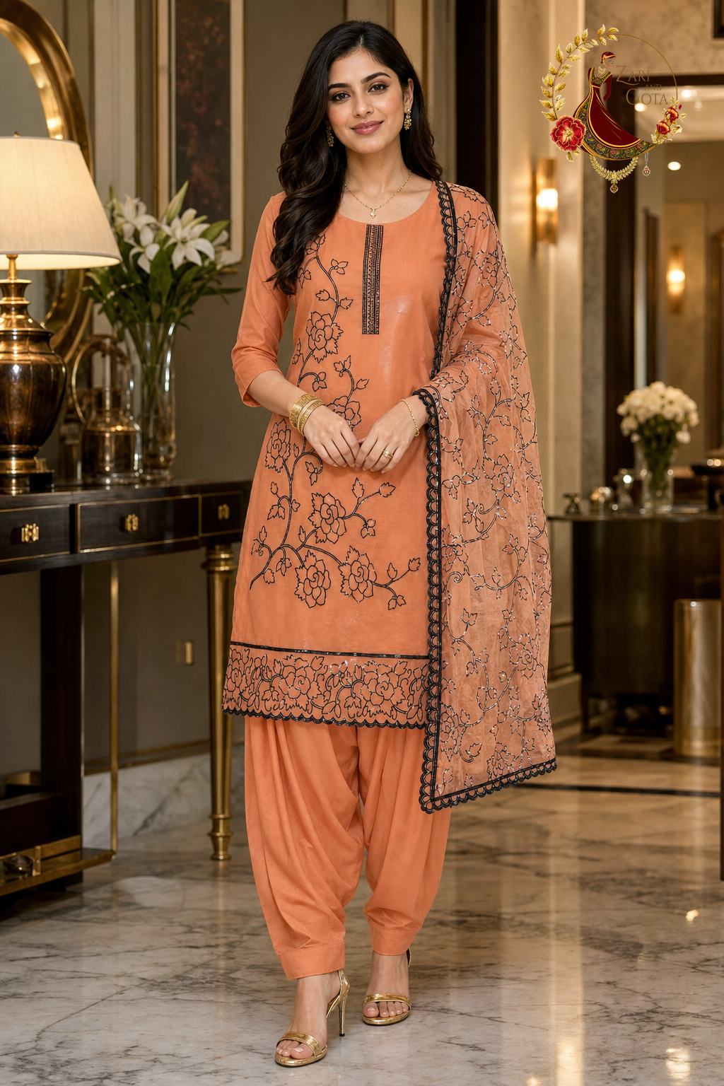 Orange tissue silk black sequin work unstitched suit set with rose-vine dupatta, worn by a model with a Punjabi salwar, Zari and Gota UK