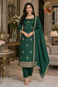 Emerald green silk unstitched suit set with kundan stone, mirror and pearl work and dupatta, worn by a model, Zari and Gota UK