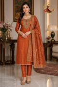 Rust orange silk unstitched suit set with antique gold cutdana neck work and woven zari Banarasi dupatta, worn by a model, Zari and Gota UK