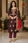Deep maroon silk unstitched suit set with kundan and dabka jhumka embroidery and two-tone maroon-red Banarasi dupatta, worn by a model, Zari and Gota UK
