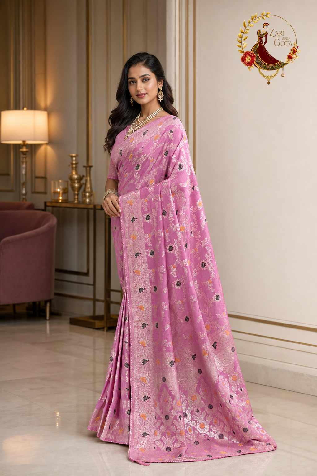Front view of the rose pink Meenakari saree showing the pleats and silver vine weave
