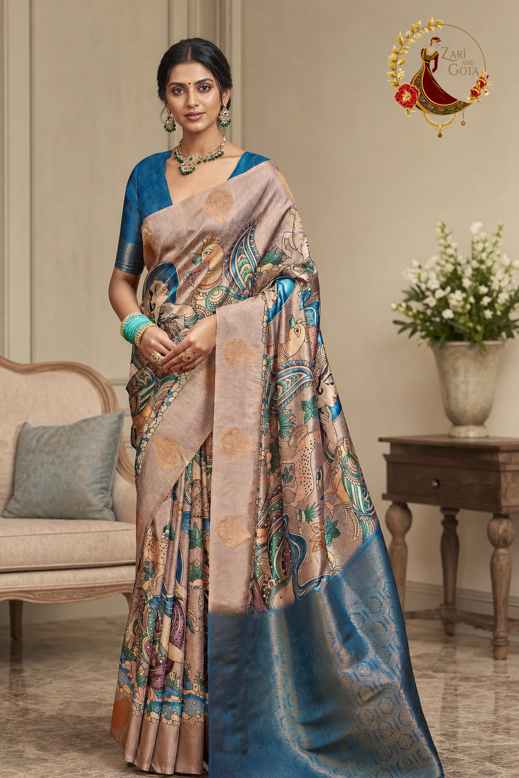 Blush and teal tissue silk saree with kalamkari-style figurative print, worn by a model