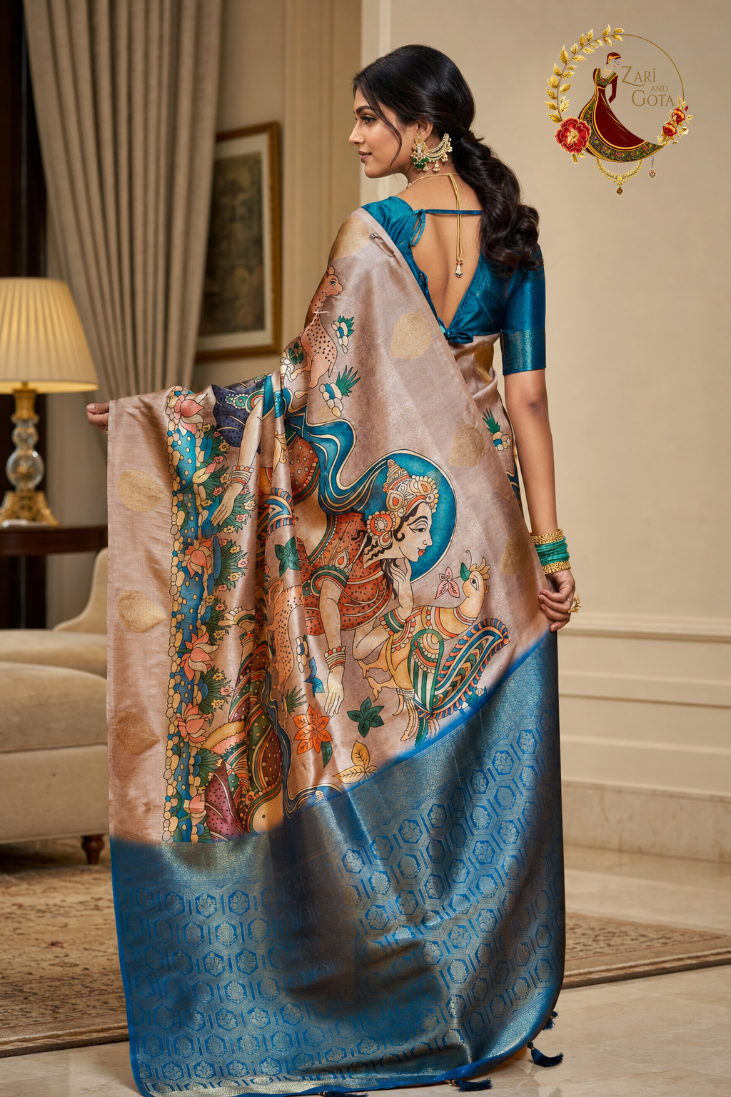 Back view showing the printed pallu scene with courtly figures and a peacock