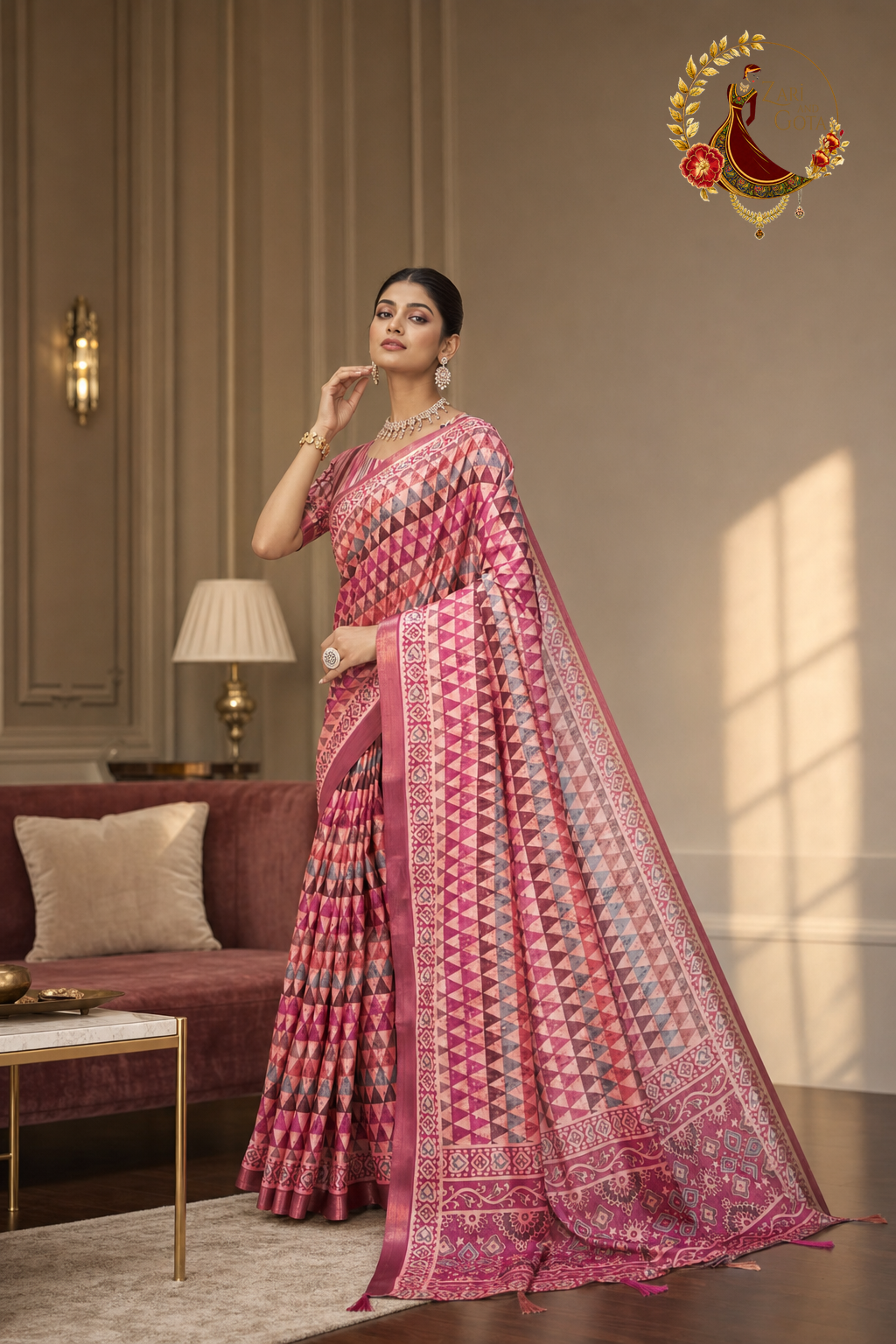 Side view of the rose pink printed saree showing the plain zari border