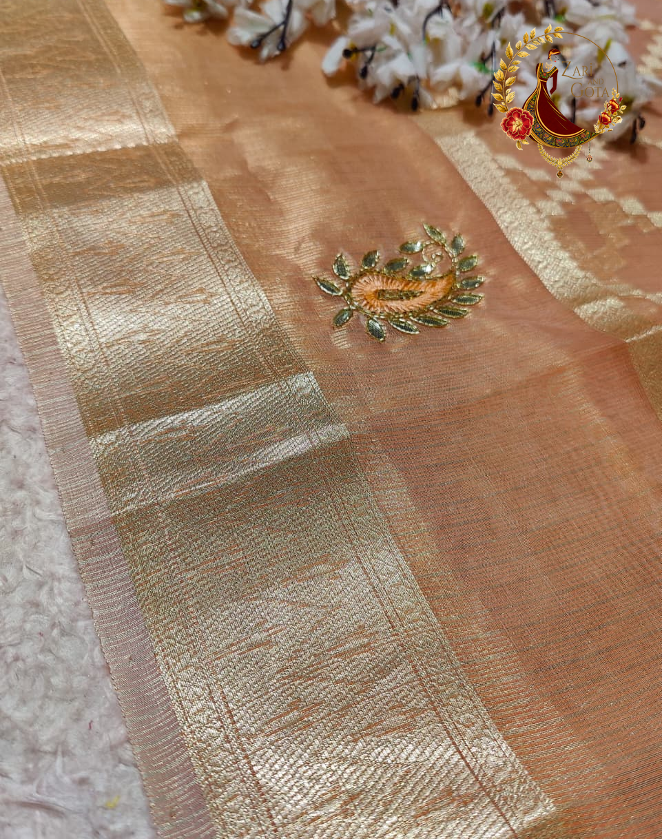 Cutdana beaded paisley motif on the gold zari border