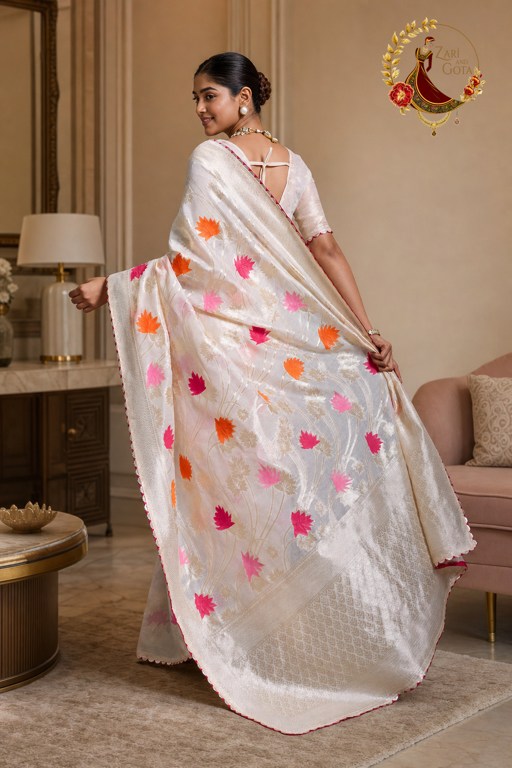 Cream khaddi silk saree with the pallu spread, showing motif spacing across the width